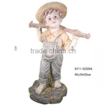 Resin boy garden statue