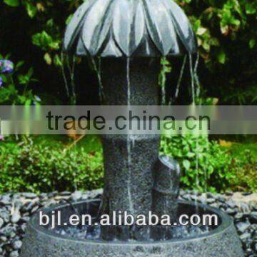 small stone carving animal figure stone fontain restaurant water feature