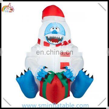 Hot sale inflatable snow monster, christmas decorative inflatable polar bear with gift, outdoor blue snowman for promotion