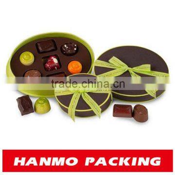 oval cardboard box with bottom and lid for chocolate