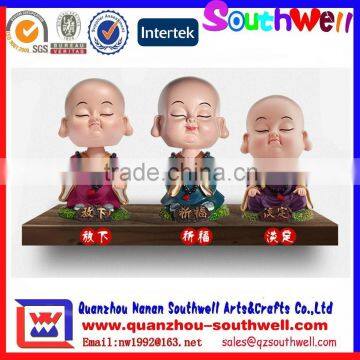 buddha bobble head