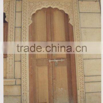 decorative hand carved door surrounding