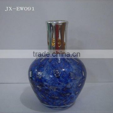 Fragrance lamp with metal cap