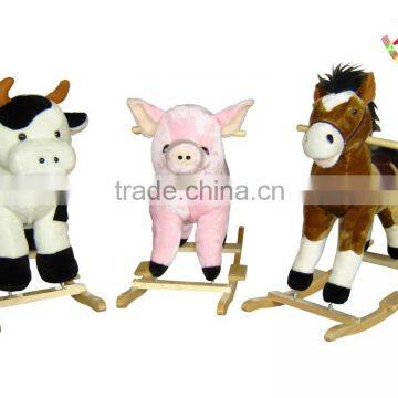 playful plush wooden rocking cow and pig animal with sound on wooden base