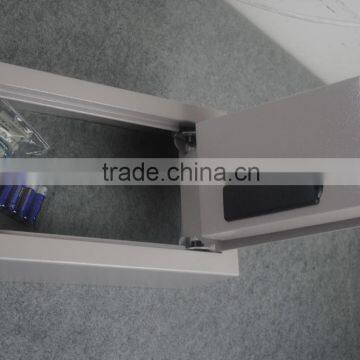 Small Open Top Safe Box With a Handle Into a Drawer