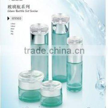 Transparent green glass bottle for cosmetic packaging with water dropper