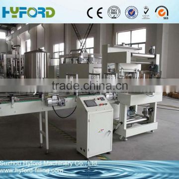 Automatic PET bottle film shrink wrapping machine with tunnel