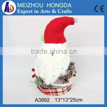 Chrimas tree hanging Santa Claus hanging on the tree