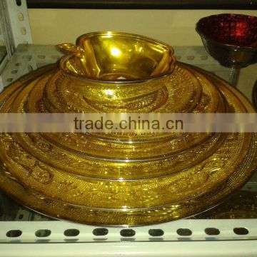 gold color glass plate set with apple bowl