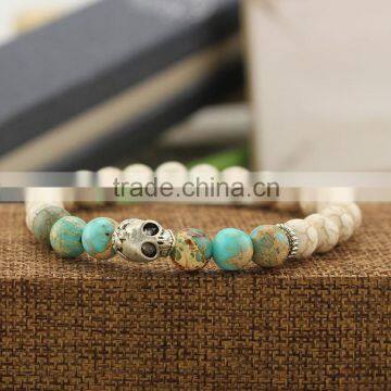 BRA0743 Blue imperial jasper & creamy howlite gemstone beaded skull bracelet