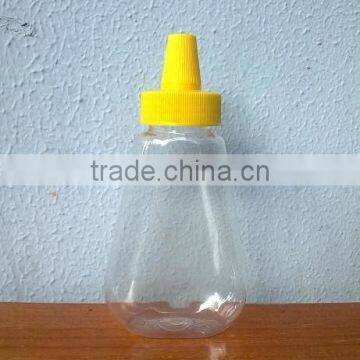 Plastic honey squeezed pet bottle with pointed mouth cap