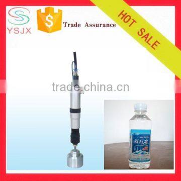 Pneumatic plastic bottle soda capping machine