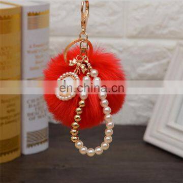2021 Wholesale custom luxury fur ball key holder Pearl keychains pom pom bow keychain for women bag  good  quality