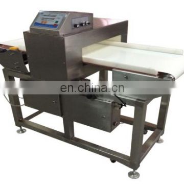 Automatic metal detector for food processing industry