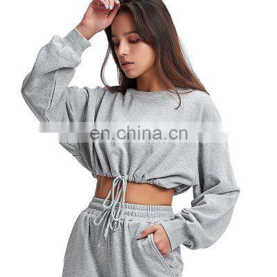 2021 European and American new women's cross-border casual fashion long-sleeved short top trousers sports two-piece suit women