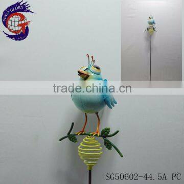 Decorating garden with shining metal bird feeder stick