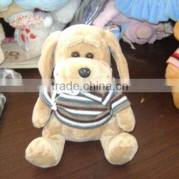 plush dog with knitted clothes