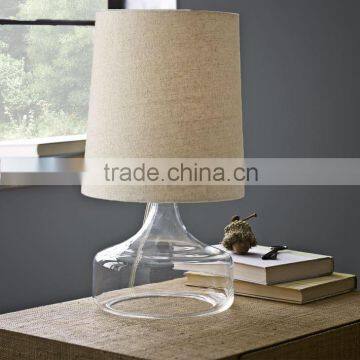 11.23-2 mid century inspired blown glass Clear Perch Table Lamp a petite silhouette elegant addition to a nightstand