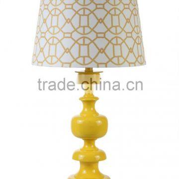 modern poly art decorative table lamp with yellow lampstand and round shade for home decor