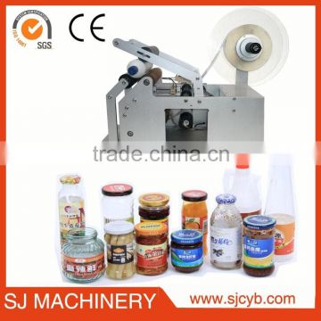 Semi-auto label sticking machine in hand