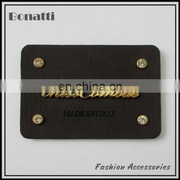 2013 Latest rhinestone leather label with golden metal logo