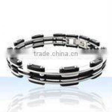 Stainless steel and rubber accent bangle bracelet