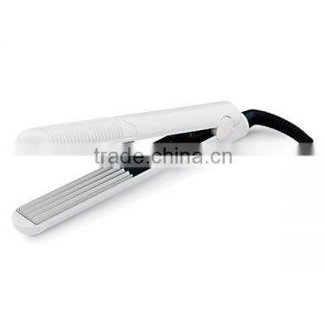 Mini hair straightener with undee plate