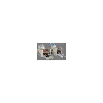 Automatic paper folding machine
