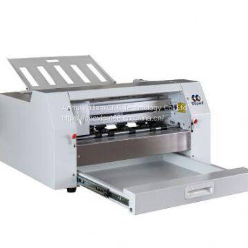 Sheet fed label cutter