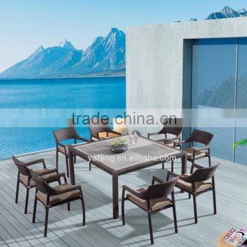 Cheap Chinese 8pcs stack chair table set with PS-wooden top