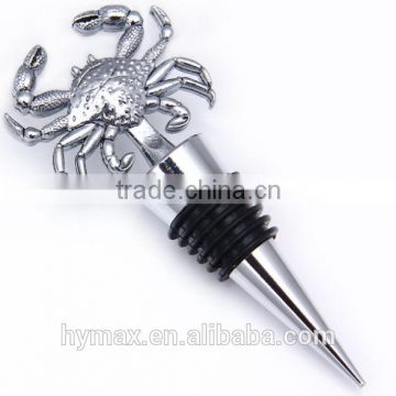 A crab shape metal wine bottle stopper