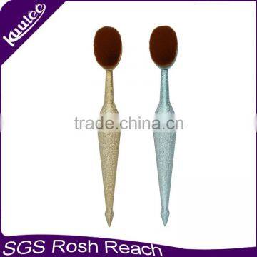 Hot sale Gold spraying fish shaped No 4 oval base makeup brush