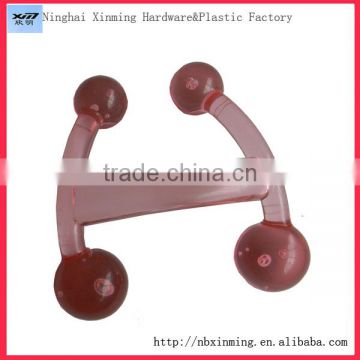 Plastic manual neck and shoulder massager