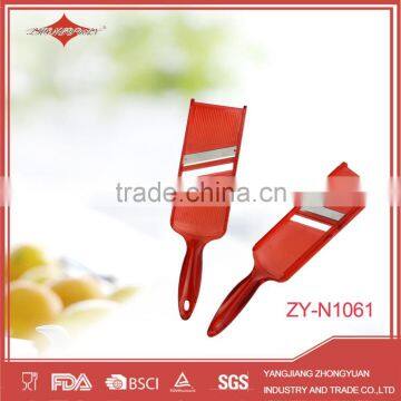 red stainless steel julienne vegetable peeler