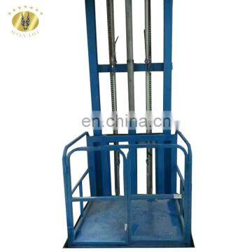 7LSJDShandong SevenLift 12m 500kg load guide rail warehouse power lift table