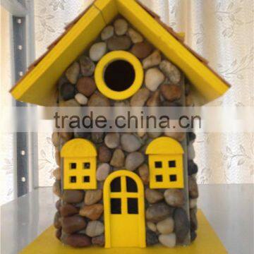 New handmade cobblestone with nature wooden birdhouse yellow