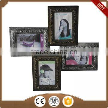 The black digital photo frame on the wall