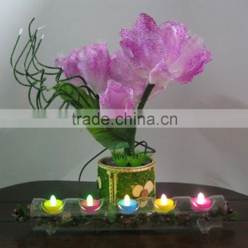 Decorative multi-colored flameless flicker led tea light candle with timer for home or party reflection