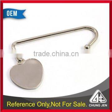 Custom design heart shape fancy cheap bag hanger hooks