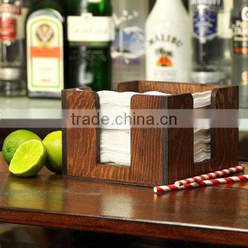 Wooden napkin caddy with a dark stain finish