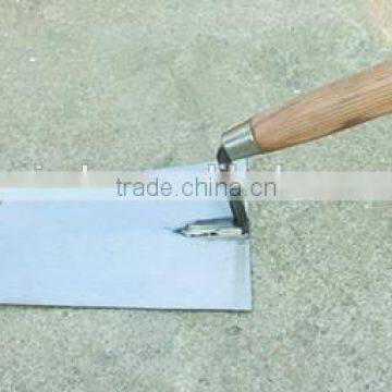 stainless steel bricklaying tools in plaster trowel