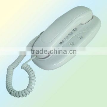 White plastic wall phone telefone