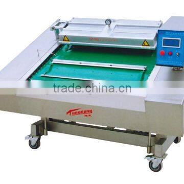 Hot sale continious belt type DZ-1090 frozen meat vacuum sealer