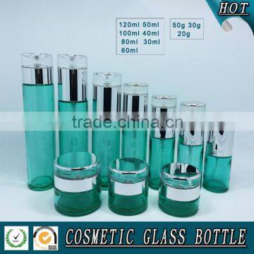 Empty Green Colored Glass Cosmetic Bottle and Cosmetic Glass Cream Jar