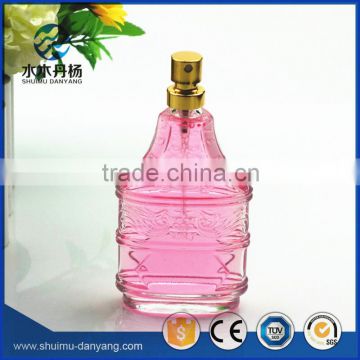 Unique shaped perfume glass bottle 50ml with golden spray                        
                                                                                Supplier's Choice