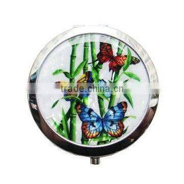 round compact shell mirror with butterfly