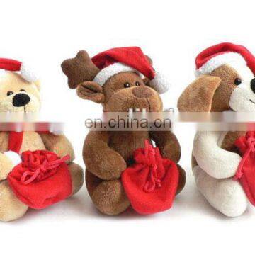 Holding a gift bag X'mas plush toys teddy bear dog moose for Christmas toys