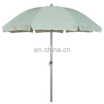 small white beach umbrella with fringe