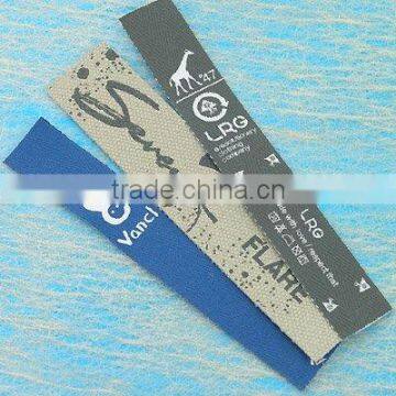 (Printed tape labels 408) Printed tape labels