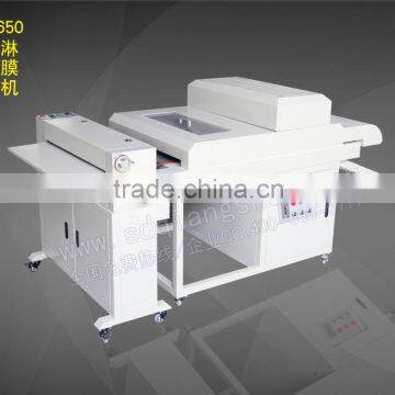 650 paper prints uv coating machine in photo studio post production